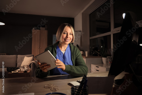 Female nurse with tablet co...