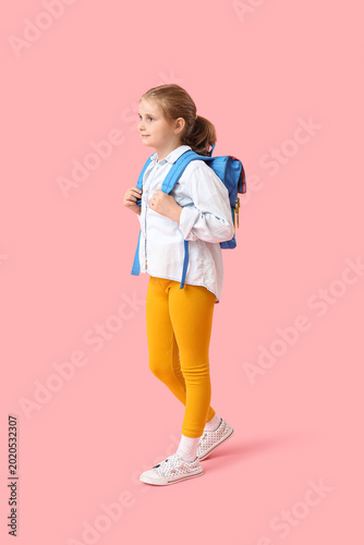 Cute little girl with backp...
