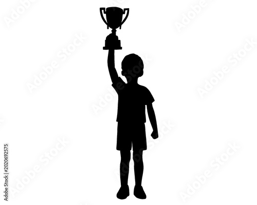 silhouette of a child holding a champion's trophy. vector illustration
