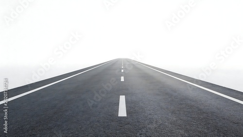 Empty road stretching into fog