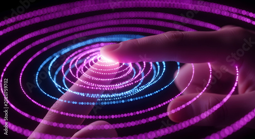 Hand interacting with glowing circular light patterns