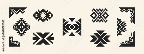 Fotografie Set of black ethnic tribal geometric symbols and decorative corner borders on ne