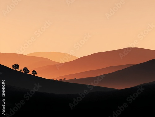 Serene sunset over rolling hills with silhouetted trees in tranquil landscape