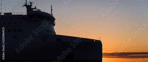 Tableau sur toile PASSENGER/CAR FERRY - The ship is heading to the seaport