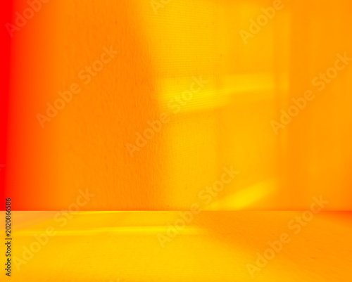 Yellow background wall gradient orange color studio room solid podium with shadow leaf on floor, backdrop summer tropical autumn season, stage template platform for presentation product promotion