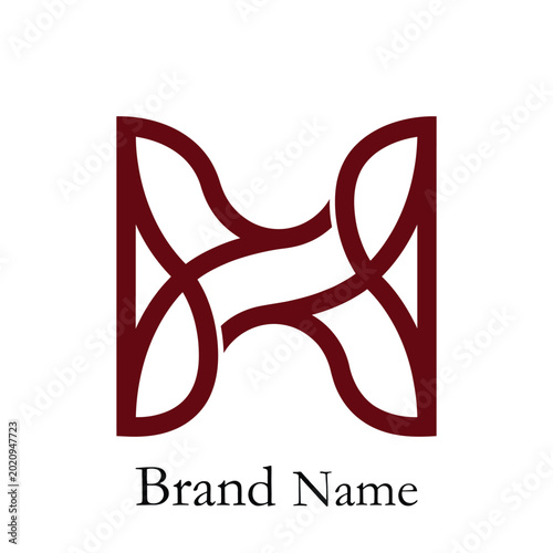 Elegant intertwining letter H logo design for a sophisticated brand identity