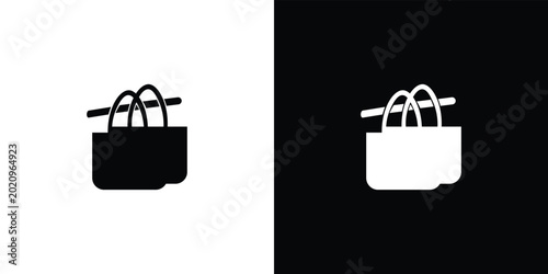 Foto Black and white of a shopping cart with a heart symbol and a white shopping bag