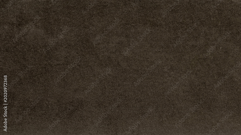 Fototapeta premium Dark brown textured desktop wallpaper with a soft, velvety appearance