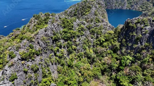 Views of the lagoons of Coron Island in the Philippines, blue loguna, drone flight