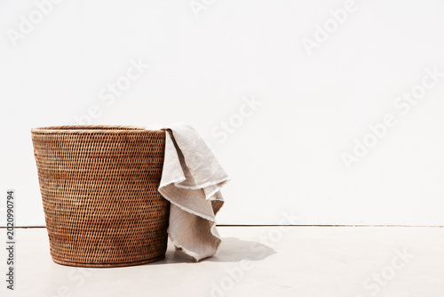 Obraz na plátně Minimalist wicker basket with cloth
