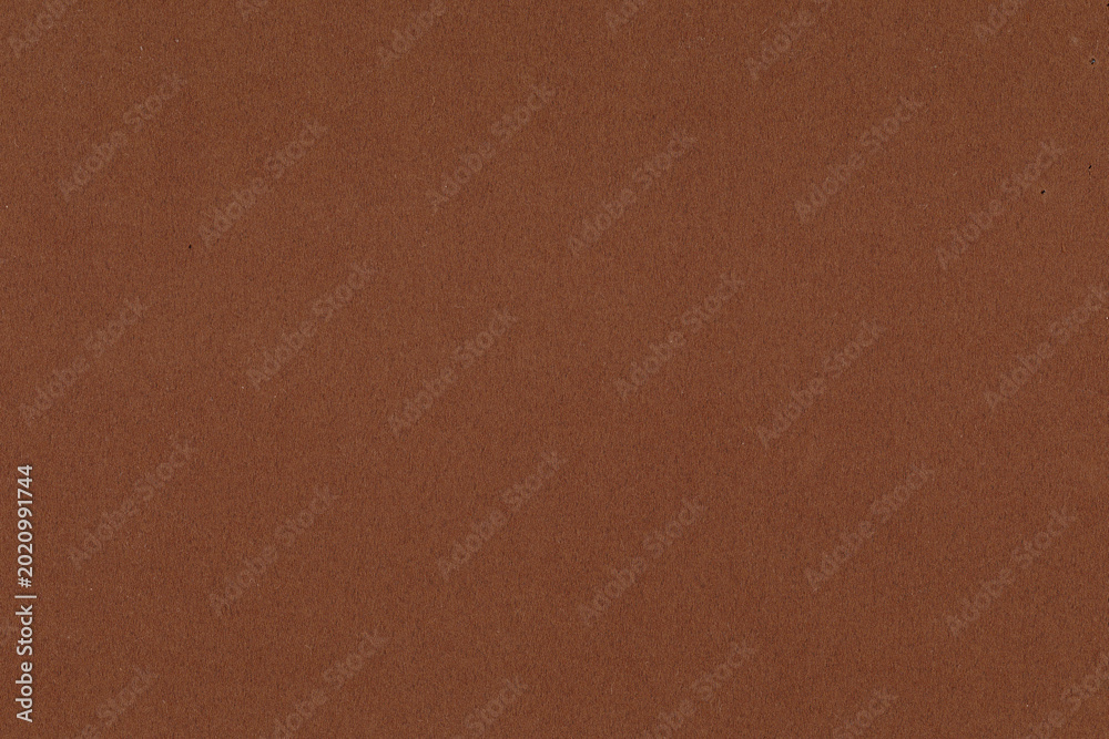 Fototapeta premium Brown textured paper background with a smooth, earthy tone
