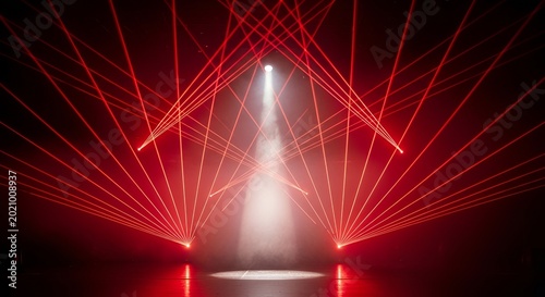 Red laser light beams illuminating smoky stage, abstract concert background, vibrant show effect