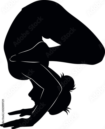 Silhouette of woman performing advanced yoga wheel pose backbend flexibility and strength training