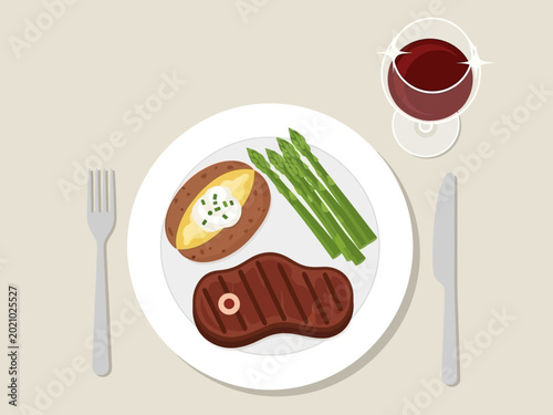 Delicious Grilled Steak Dinner with Baked Potato and Asparagus.