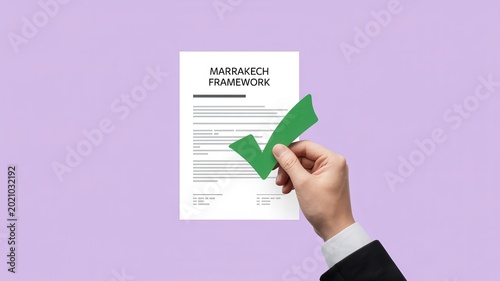 Person holds a paper with green checkmark in hand successfully