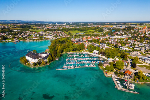 фотографія Aerial drone view of Schloss Kammer and marina at Lake Attersee in the Salzkamme