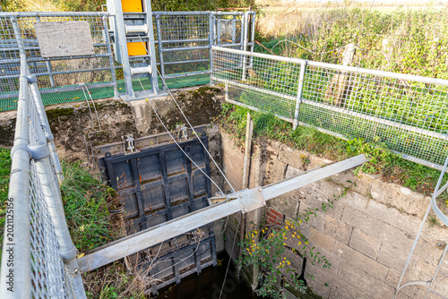 Canvas-taulu A River Severn sluice gate helping to avoid flooding near the Severn Vale villag