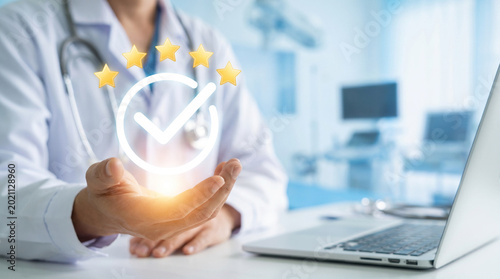 Doctor in hospital presenting check mark badge for trusted healthcare and professional service