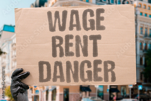 Foto "Wage Rent Danger" Stagnant wages permanent rent and product dangers compound working-class hardship
