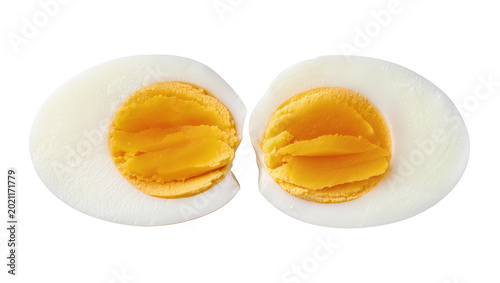 Canvas-taulu Two halves of a hard-boiled egg showing white albumen and yellow yolk, isolated