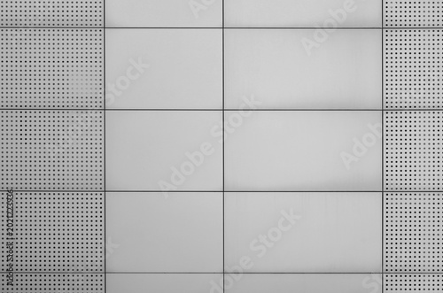 Photos Metal panels with sound absorbing perforated panels by sides, on ventilated facade