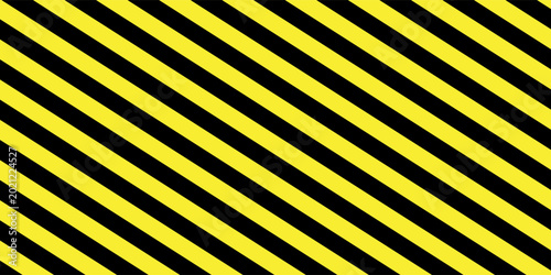 Yellow and black striped lines seamless pattern or texture. Under construction and safety background.
