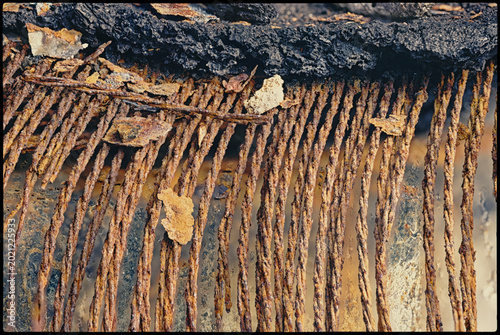 rusted parts of an old wheel