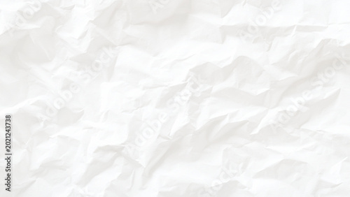 Photos Crumpled white paper texture background with wrinkled and creased surface closeu