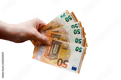 Картината върху платно Close-up of a human hand holding a fan of fifty euro banknotes, isolated on a cl