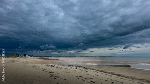Foto Ciel nuageux sur plage et blockhaus, Noirmoutier