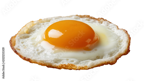 Photos Crispy fried egg with bright orange yolk, isolated on transparent background