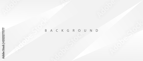 minimal gray geometric background with abstract light shapes.