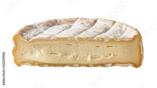 Vászonkép Slice of soft bloomy rind cheese with creamy yellow interior, isolated on transp