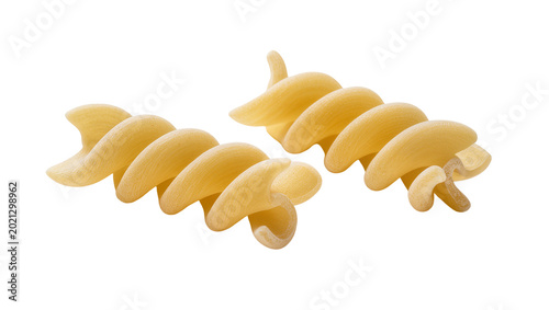 Fotografie Golden fusilli pasta spirals dry uncooked durum wheat semolina, isolated on tran