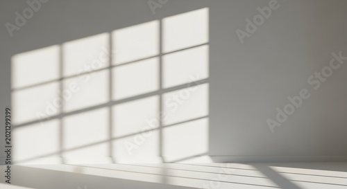 Saudi cultura sunlight streaming through a large window onto a white floor and wall in a room with a grid pattern