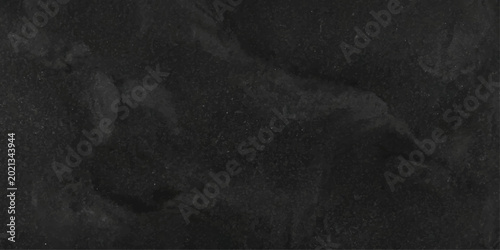 Φωτογραφία A dark stone texture offering a glimpse into the beauty and intricacy of nature'