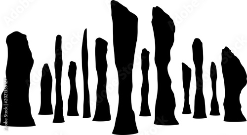 Foto Set of tall rock pillar silhouettes representing natural geological formations a