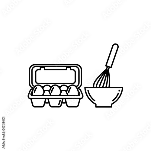 Egg carton and bowl with whisk for baking preparation  