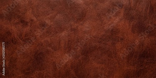 Photos A close-up captures a rustic texture of brown leather, showcasing the natural gr
