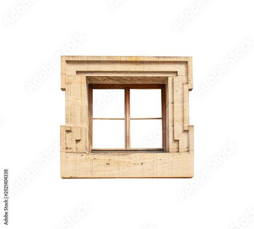 Isolated square wooden window frame set within a massive decorative stone surround, featuring a historic European architectural design on a white background