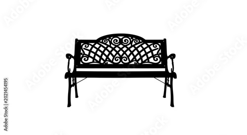 Bild auf Leinwand Ornate black metal garden bench with intricate scrollwork design on backrest and