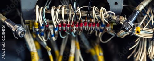 Valokuva Aircraft wiring and avionics connectors inside maintenance compartment bundled cables industrial electronics