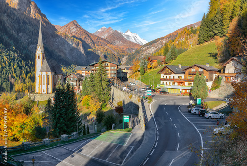 Photos Amazing autumn landscape  at Heiligenblut with St Vincent Church near Grossglockner mount