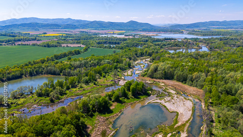Bild auf Leinwand Panoramic aerial drone view of the Nysa Klodzka river bends near Kamieniec Zabko