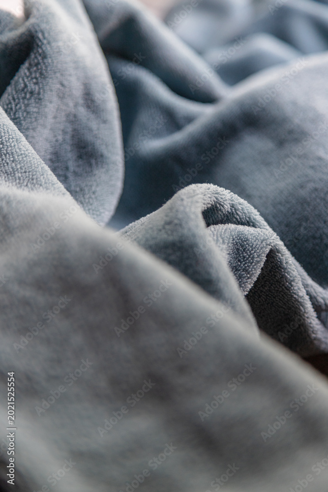 Fototapeta premium Creative fuzzy fabric textures in blue tones, suitable as abstract banner backgrounds and textile texture design.