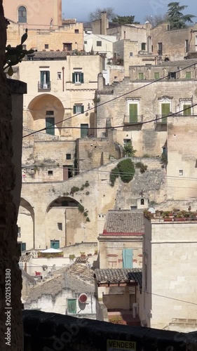 Historic stone houses of Matera, Italy. Ancient limestone architecture, cave dwellings, balconies and narrow streets create a unique Mediterranean old town atmosphere.