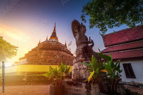 Photos Buddha statue and Phra Chedi Luang in Temple (Thai language:Wat Ratchaburana) is a Buddhist temple It is a major tourist attraction in Phitsanulok, Thailand