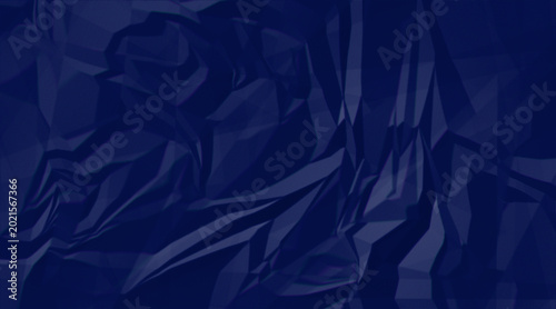 Abstract dark blue crumpled paper texture with geometric folds and shadows
