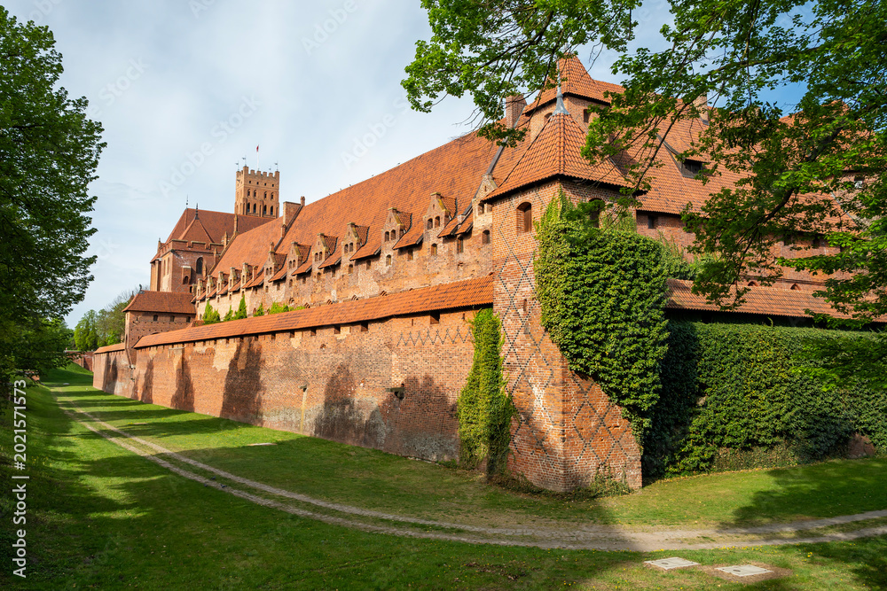 Fototapeta premium Malbork Castle, on the banks of the Nogat River. Malbork, Poland