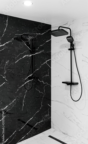 Luxury bath shower with minimalist black and white  marble stone